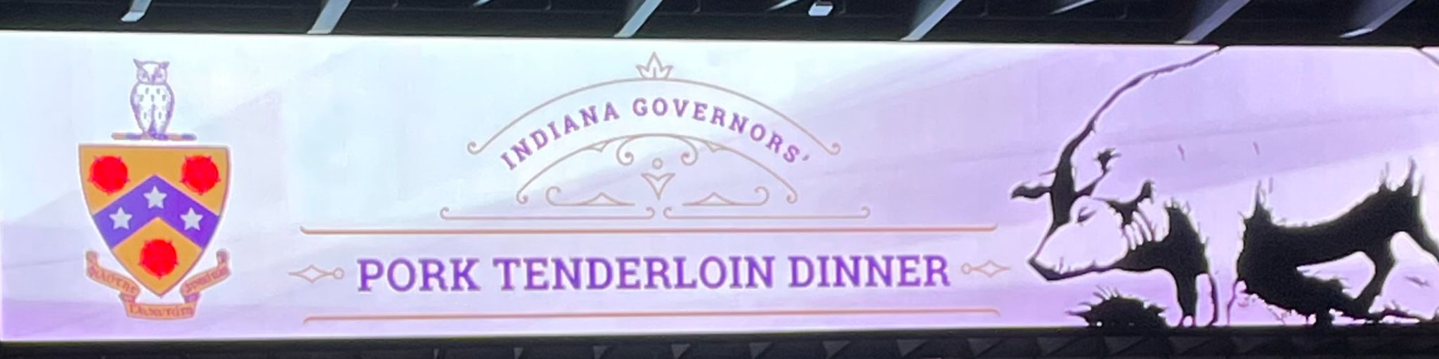 Signage for the Phi Gamma Delta Indiana Governors' Pork Tenderloin Dinner, with the fraternity crest